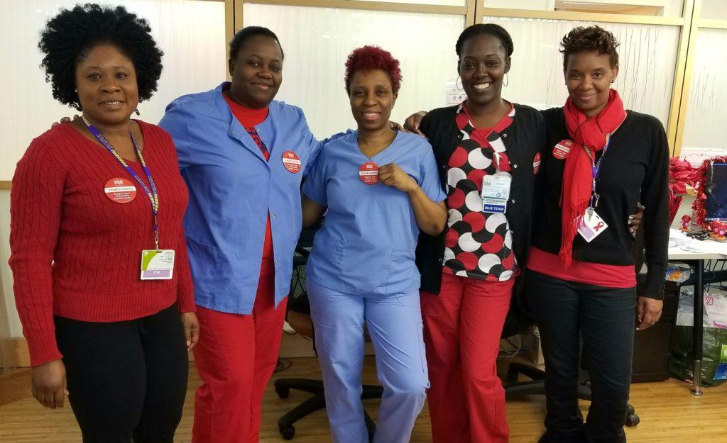 Harlem health center staff wear red on day of demonstration