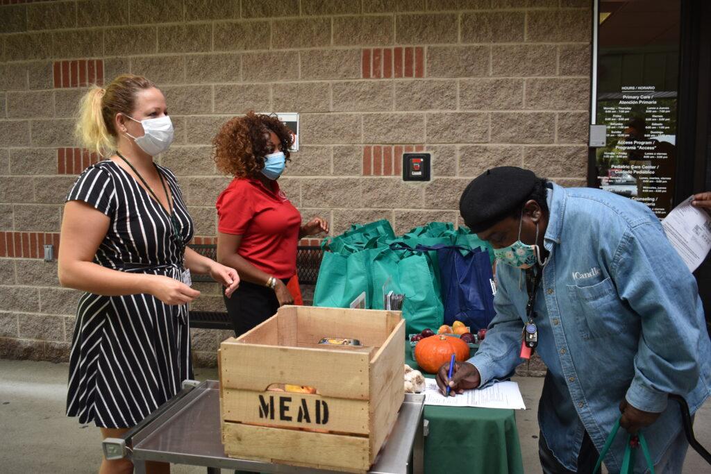Staff at the Kingston Family Health Center distribute fresh organic produce to patients as part of the Local Produce Prescription Program (Photo courtesy of the Hudson Valley Farm Hub).